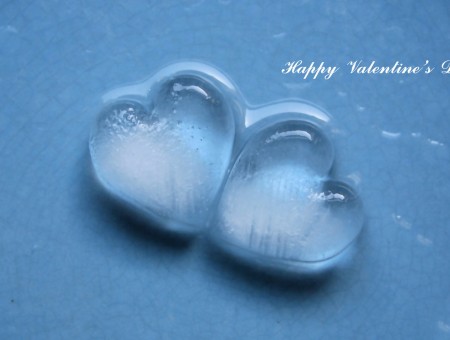Two Heart-shaped Water Droplets Labeled Happy Valentine's Day Sign
