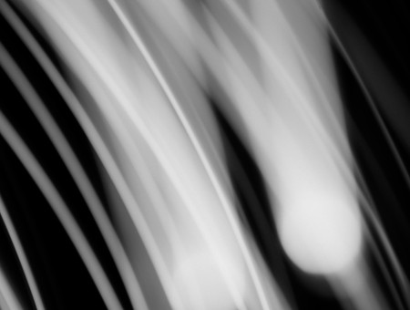 Blurred Motion Photo Of White Lights On A Black Background