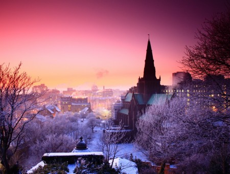 Pink Sky Over Churches And City