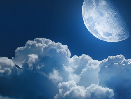Moon Near White Clouds At The Sky