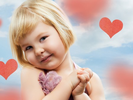 Girl Embracing Purple Flower With Hearts Smiling