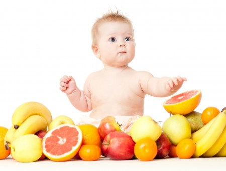 Infant Surrounded By Fruits