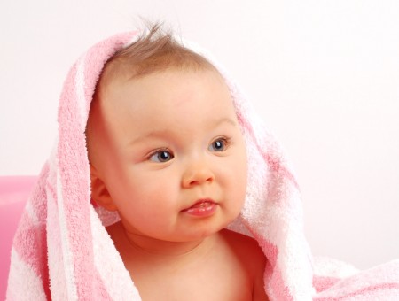 Baby In Pink And White Textile