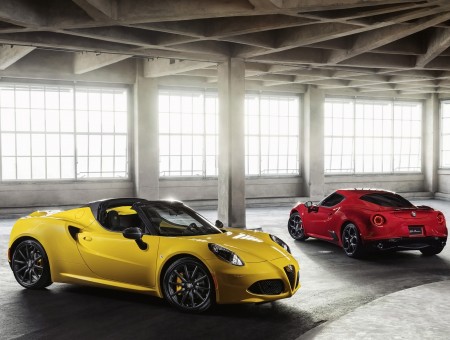 Yellow Sportscar With Red Sportscar In A Warehouse