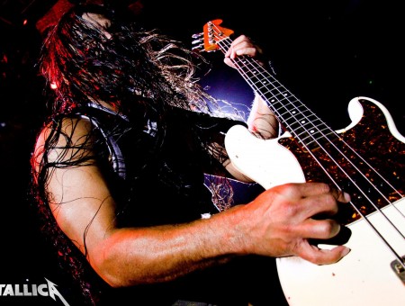Metallica Band Member Playing White Electric Guitar