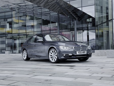 Gray BMW Car On Gray Brick Floor