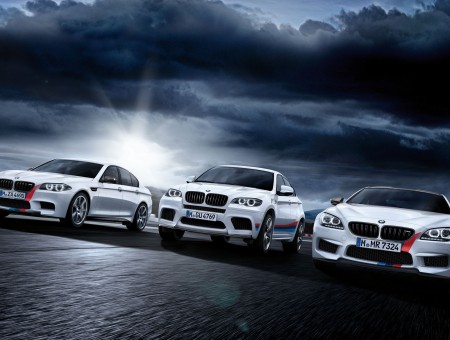 3 White BMW Cars 