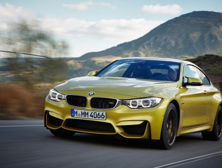 Yellow BMW M3 On Road During Daytime
