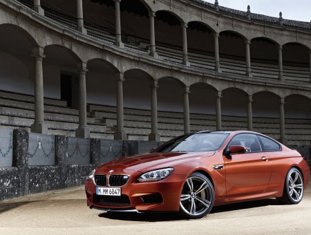 Red BMW M6 Car On Gray Floor