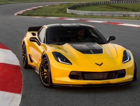 Yellow Sports Car On Race Track At Daytime
