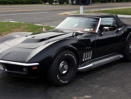 Black Classic Chevrolet Corvette Stingray On Driveway
