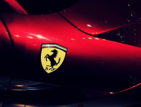 Ferrari Logo On Red Car