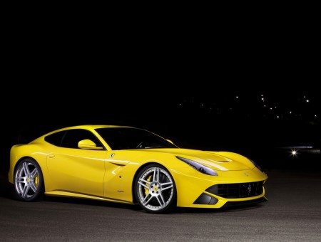 Yellow Ferrari Ff On Asphalt Road During Night Time