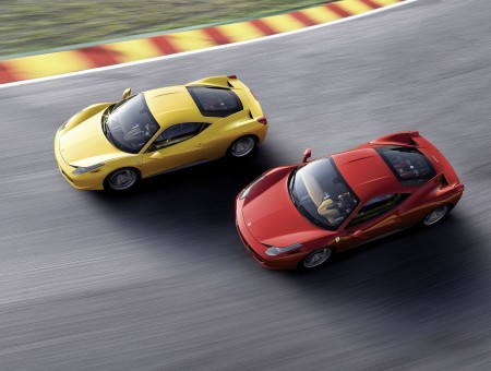Red And Yellow Sports Cars Racing On The Track