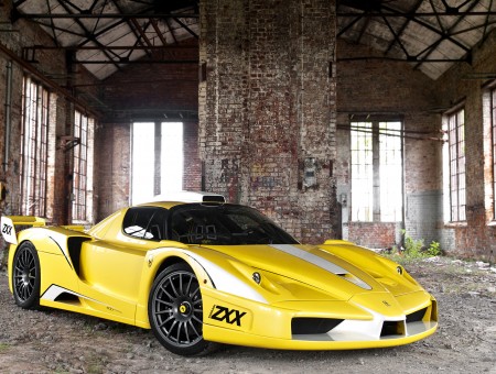 Yellow Ferrari Super Car Inside Building