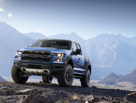 Blue Ford Raptor Truck During Daylight