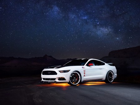 White Coupe With Spoiler Under Blue Starry Sky