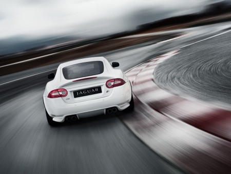 White Jaguar Car On Gray Road Selective Focus Photography