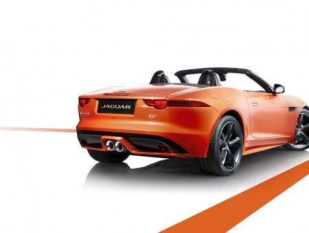 Orange Jaguar Convertible On White Floor