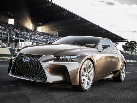 Brown Lexus Coupe Sports Car On Race Track