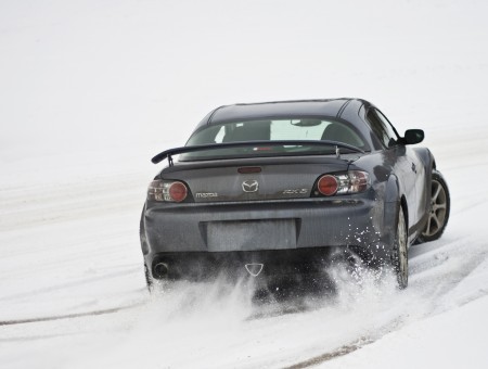 Black Mazda Car On Snow Field