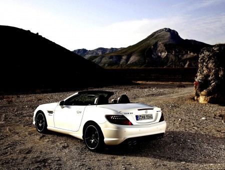 White Convertible With Mountain Range In Sight