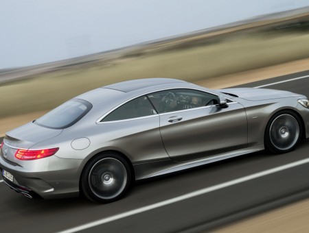 Silver Mercedes Benz Coupe In Road During Daytime