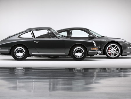 2 Classic And Latest Model Of Porsche 911s Side By Side