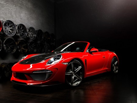 Red Porsche Roadster In Garage