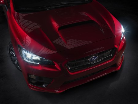 Red Subaru Br-z With Headlights Turned On