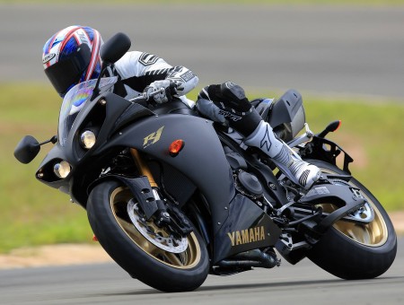 Black Yamaha Motorbike On A Curved Road