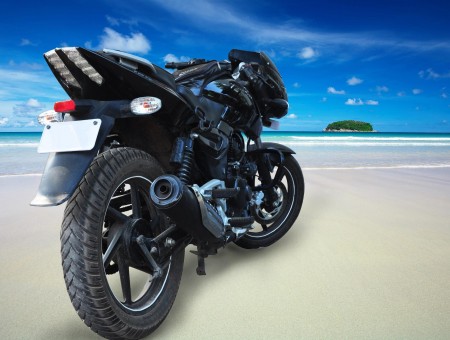 Black Kawasaki Bajah Rouser 135 On Beach