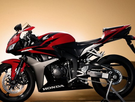 Red And Black Honda Motorcycle