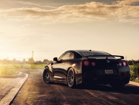 Black Nissan GT-R R35 On Road During Sunset