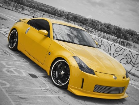 Yellow Nissan Z Coupe On Gray Floor