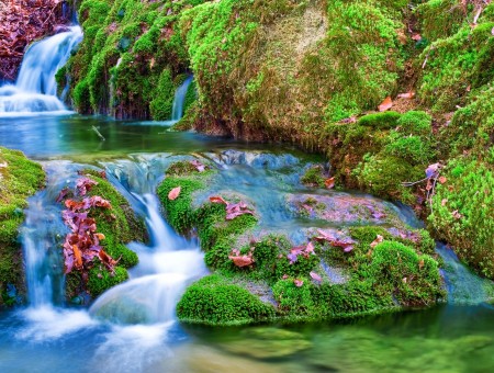 Waterfall With Green Moss During Daytime
