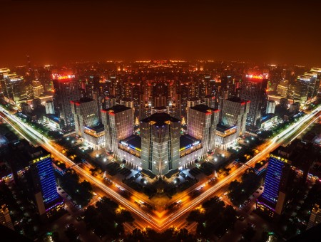 Aerial View Of High Rise Skyscrapers During Nightime