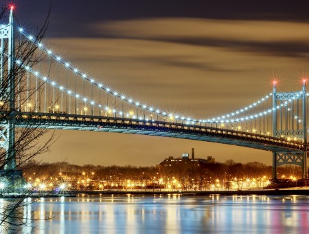 Lighted Gray Metal Bridge At Night