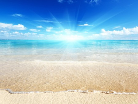 Beach Beside Brown Sand Under Blue Sky And White Clouds