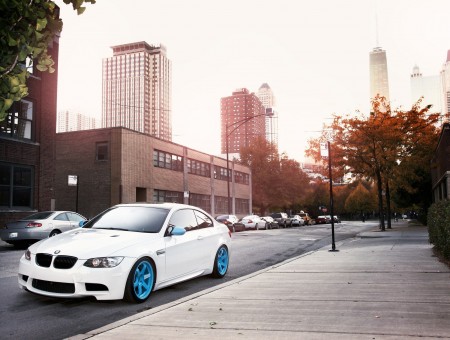 White BMW M3 Parked In Curb