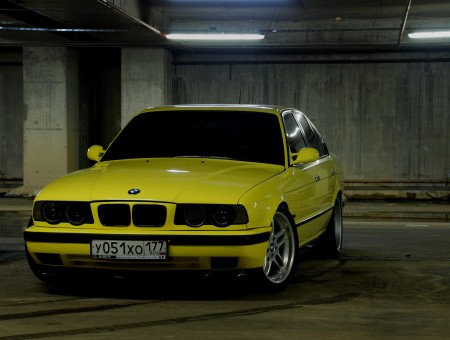 Yellow Sedan At The Parking Lot
