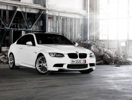 White BMW 3 Parked Inside Garage