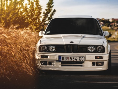 White Classic BMW M3 Parked On Side Of Road
