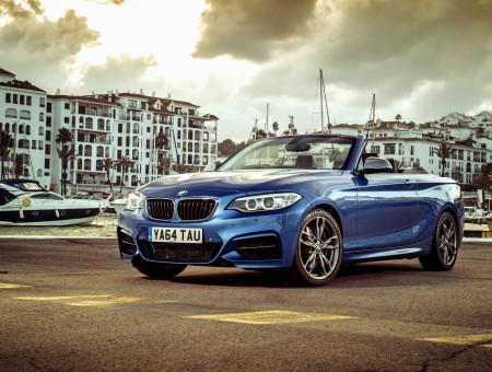 Blue BMW 3 Series Convertible Parked In Dock