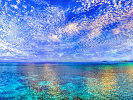 Blue Ocean Under Blue Sky And White Clouds