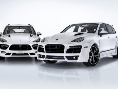 2 White SUV Porsche