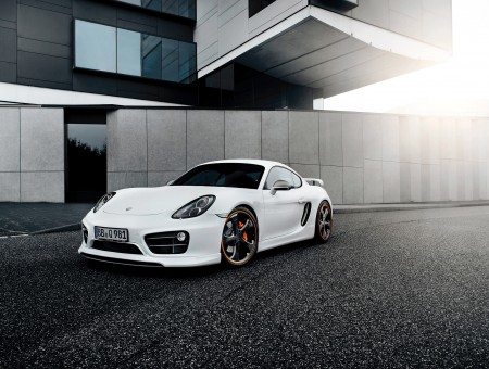 White And Black Porsche In Front Of Black And White Building