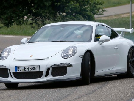 White Porsche 911 On Road