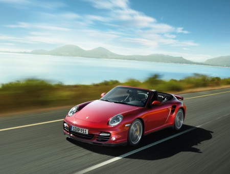 Red Porsche Boxster On Road