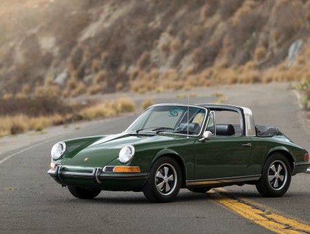 Green Porsche Targa Convertible In The Middle Of The Road